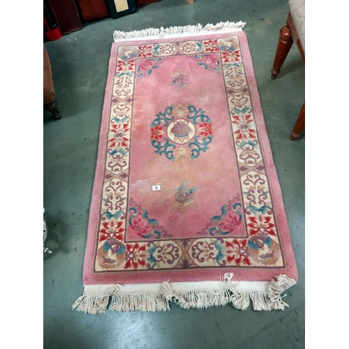 50 - A pink wool rug, COLLECT ONLY.