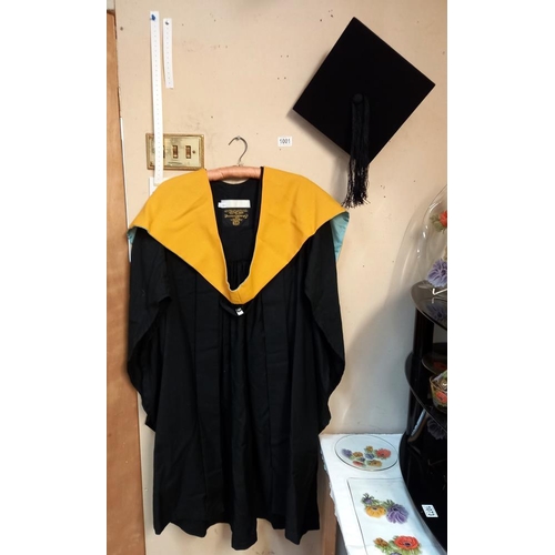 1001 - A boxed mortar board & Graduation gown