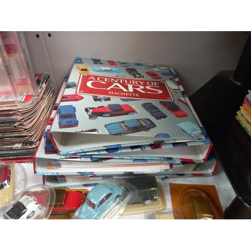 1034 - A quantity of Century of Cars magazines & die cast cars etc. COLLECT ONLY