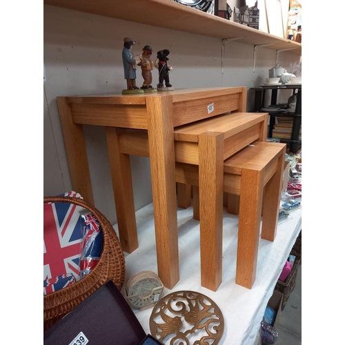 1037 - A modern solid oak nest of tables COLLECT ONLY