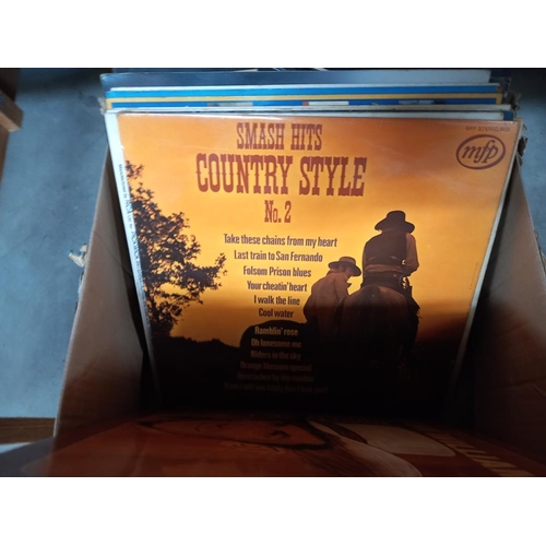 1107 - A box of vinyl records including The Shadows, country and western etc