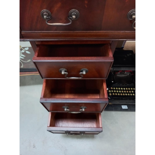 1131 - A dark stained double pedestal desk with gilded green leather top COLLECT ONLY