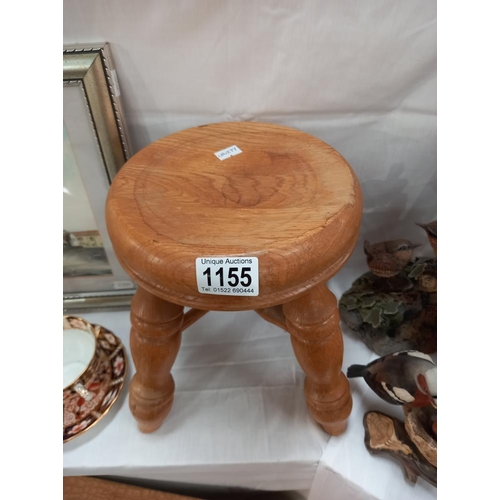 1155 - A small oak stool with turned legs COLLECT ONLY.