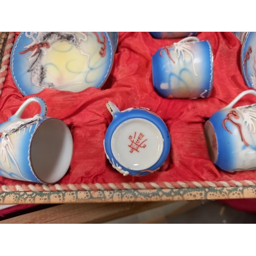 1168 - A vintage cased Japanese relief painted tea set COLLECT ONLY