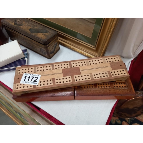 1172 - An antique mahogany boxed Bezique card game & cribbage boards etc.