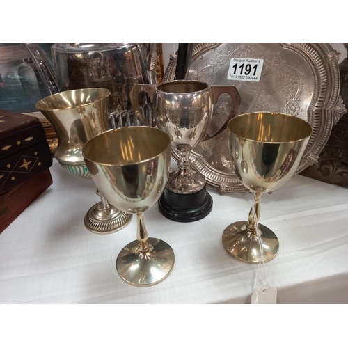 1191 - A pair of silver plated Merton college Regatta goblets dated 1888 'scratch pairs & punt race' etc. C... 