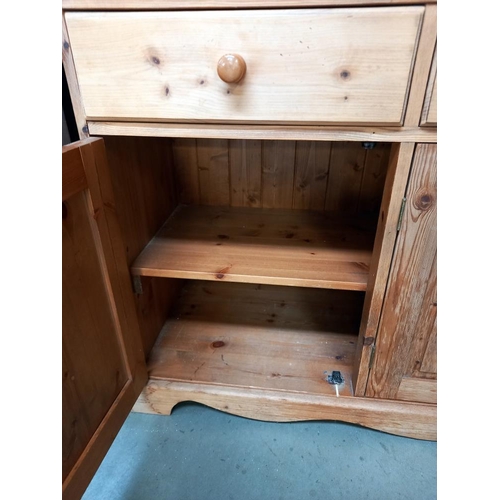 1265 - A three door pine dresser, COLLECT ONLY.