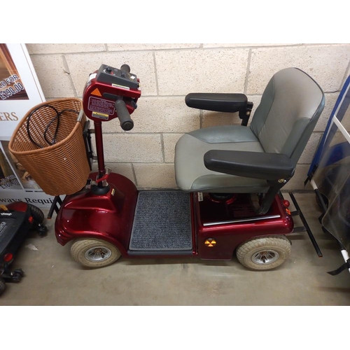 1307 - A Shoprider mobility scooter with charger, no key, & does not appear to charge, Untested. COLLECT ON... 