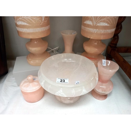 23 - A good selection of pink alabaster including a pair of table lamps, comport, vases and trinket pot C... 