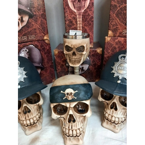 4 - 4 boxed gothic skull/police money boxes, 1 skull money box and a goblet