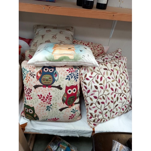 40 - A good lot of cushions, including bees, owls, hares etc