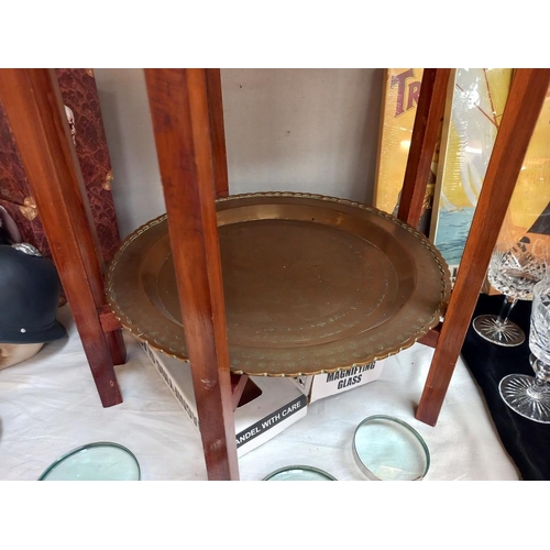 6 - A 2 tiered brass tray/table on wooden legs height 54cm, diameter of top tray 51cm COLLECT ONLY