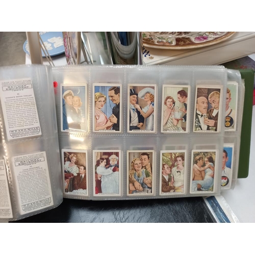 62 - 3 cigarette card folders with 10 sets in each