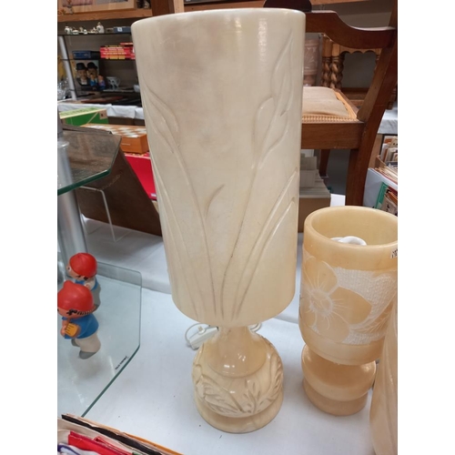 69 - A pair of polished alabaster table lamps plus 2 others and a vase COLLECT ONLY