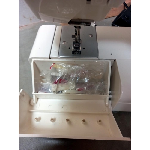 8 - A Queen deluxe sewing machine