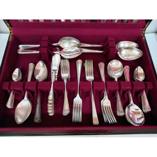 119 - A 6 piece setting cased cutlery set (approximately 68 pieces)