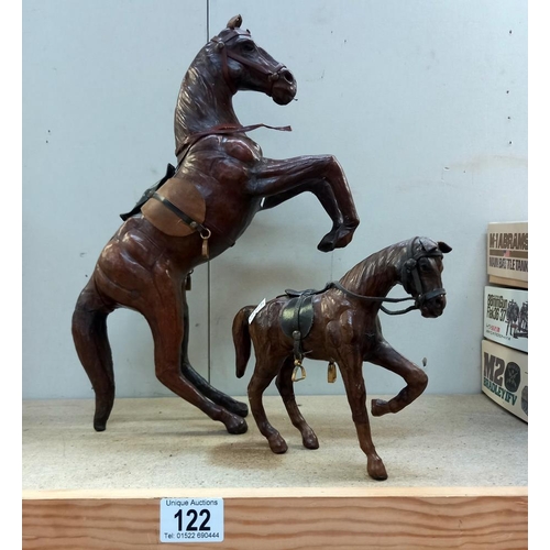 122 - 2 leather horses