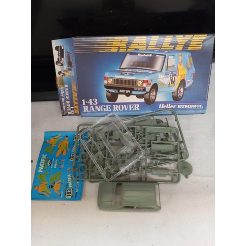 133 - A quantity of boxed model kit vehicles etc including Airfix Revell and Tamiya