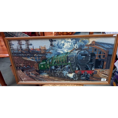 140 - A framed and glazed tapestry of a steam engine 92220 Evening Star leaving Paddington COLLECT ONLY