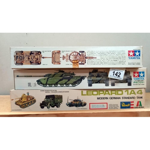 142 - 2 Tamiya and 1 Revell military vehicle model kits all bagged and sealed