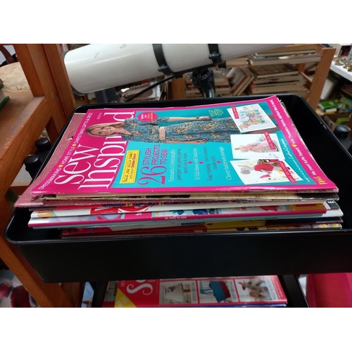 82 - A quantity of craft books, magazines and storage trolley COLLECT ONLY