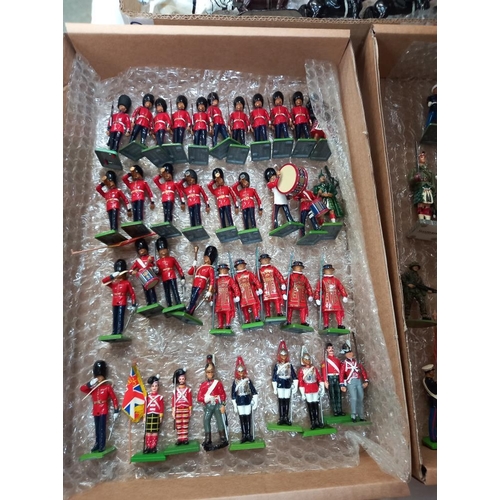 83 - A large quantity of Britain's soldiers (re-painted) and some empty boxes