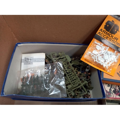 96 - A large box of plastic soldiers and military vehicles