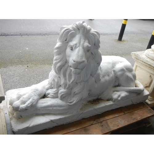 1668 - A large garden sculpture of a reclining lion, COLLECT ONLY.