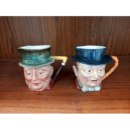 166 - A quantity of small character jugs & condiment set