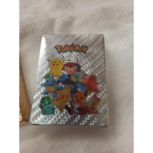 167 - 3 sealed Pokémon card sets (gold/silver/black