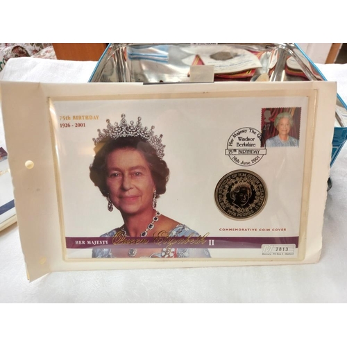 169 - 4 x £5 coins & another Crown & a good selection of stamp presentation sets