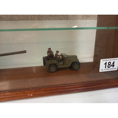 184 - A model display cabinet with 2 plastic military models COLLECT ONLY