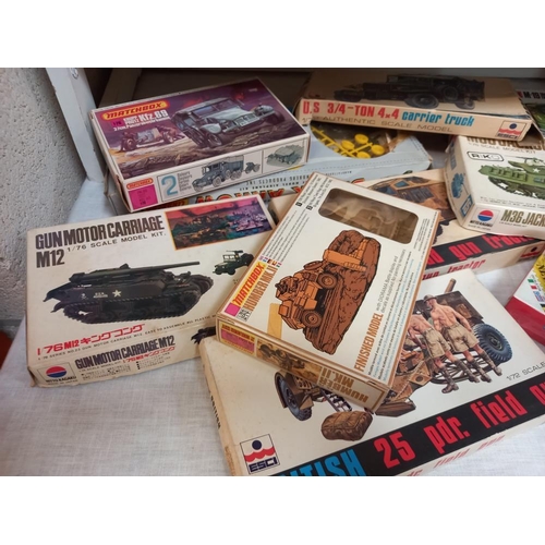 187 - A quantity of military model kits including Matchbox, Airfix & Esci etc. (unchecked)