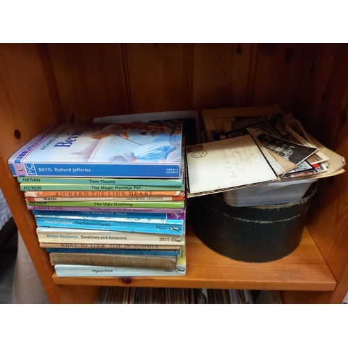 190 - A quantity of ephemera, mainly postcards, Ladybird books & other books etc.