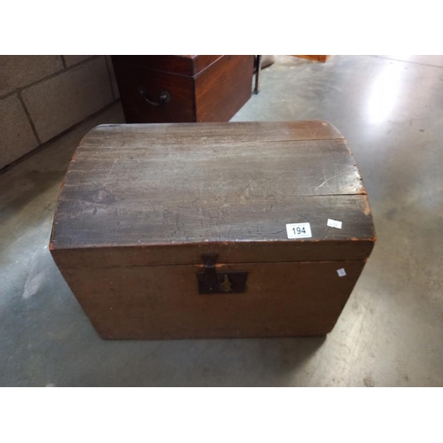 194 - A 19th/20th century dome top trunk, lined with period advertising newspapers COLLECT ONLY