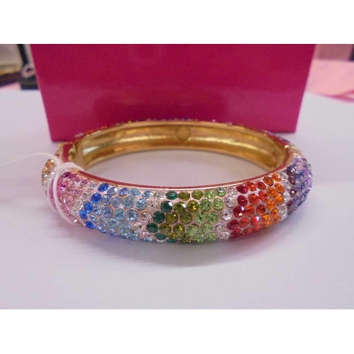 1003 - A boxed Butler & Wilson sparkly bangle.