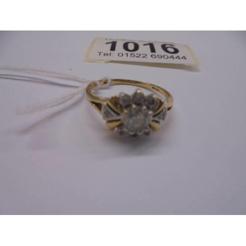 1016 - A yellow gold cluster ring, marked 10k, size Q, 3.2 grams.