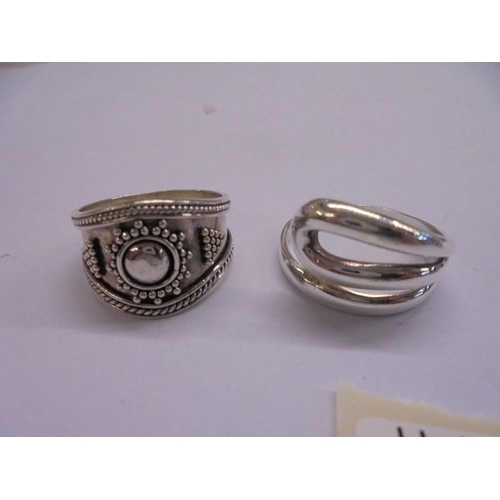 1032 - Four silver rings, 18 grams.