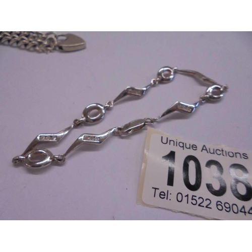 1038 - Two silver bracelets, 28.6 grams.