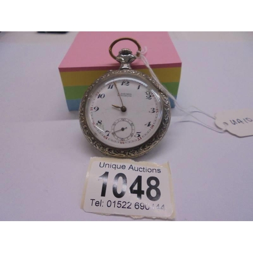 1048 - An old pocket watch in a case featuring a Blacksmith shop marked H Girard Besancon.