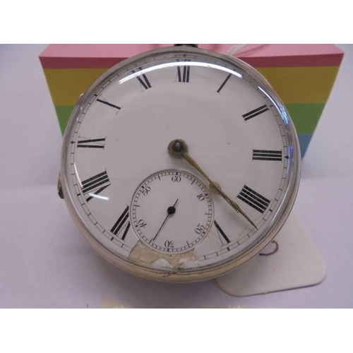 1050 - A silver pocket watch in working order but missing key.