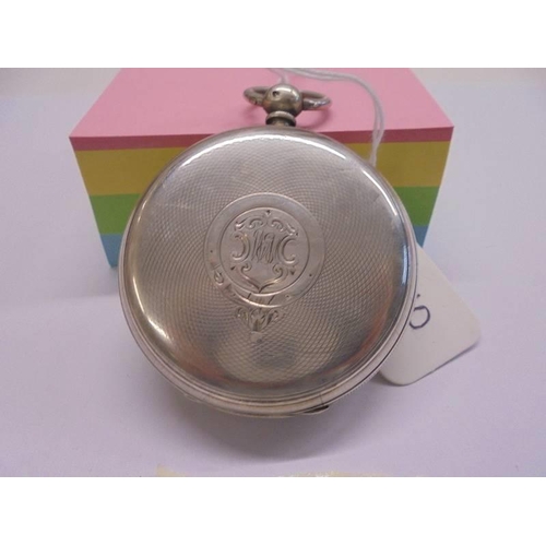 1050 - A silver pocket watch in working order but missing key.