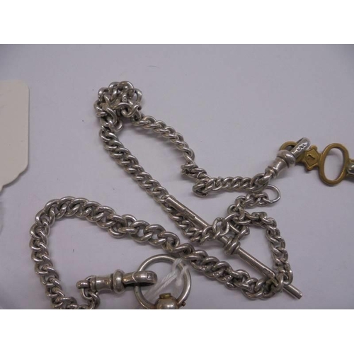 1055 - A Victorian ladies silver fob watch on silver chain, in working order, (chain 21 grams).