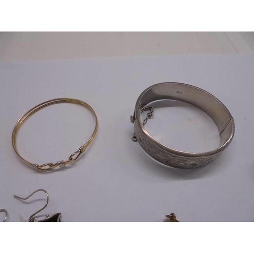 1066 - A quantity of silver jewellery including bangle, earrings, cameo etc., and items of yellow metal