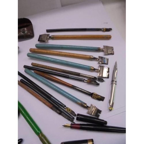 1078 - A mixed lot of vintage dip pens, fountain pens, nibs etc.,