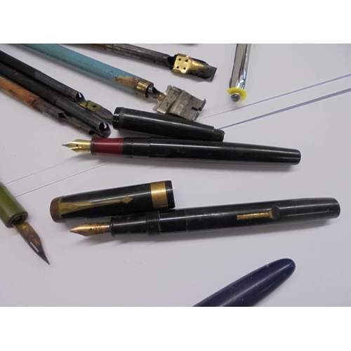 1078 - A mixed lot of vintage dip pens, fountain pens, nibs etc.,