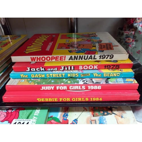 14 - A good lot of vintage annuals from the 70's/80's including Dandy, Whoopee!, Wham!, Bunty, Debbie, Ju... 