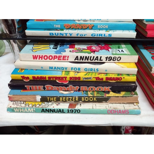 14 - A good lot of vintage annuals from the 70's/80's including Dandy, Whoopee!, Wham!, Bunty, Debbie, Ju... 