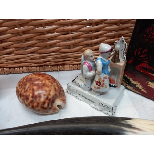 20 - A mixed lot including vintage tins, cow's horns, a fairing entitled 'The wedding night' and a shell