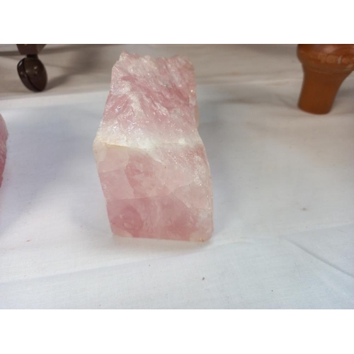 58 - Two pieces of pink rock crystal